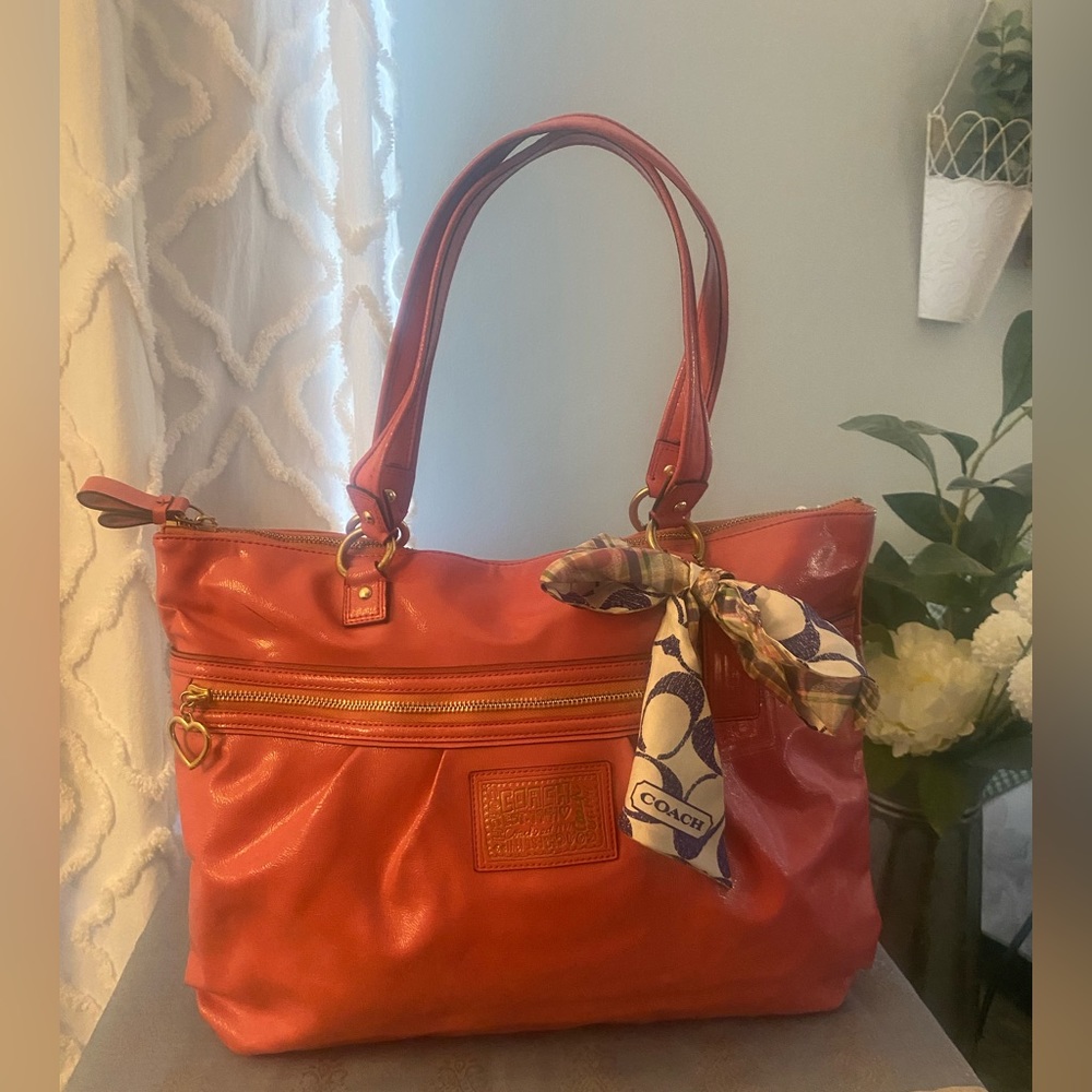 Pink Coach vinyl tote bag with signature bow